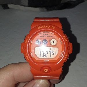 Casio BabyG orange digital watch.